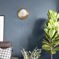 Applique murale Justyne avec globe en verre de luxe
