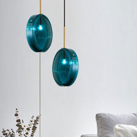 Suspension Harpais en verre bleu.