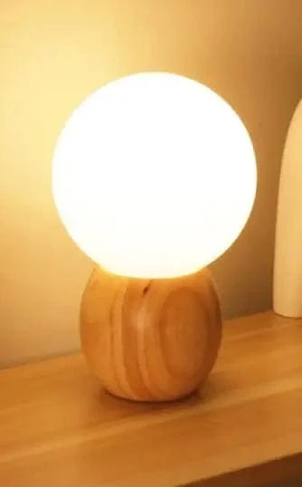 Lampe de table en bois pour une ambiance chaleureuse dans votre chambreAsStringAsync.