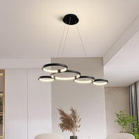 Lustre Hirva avec anneaux LED suspendus