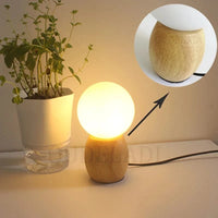 Lampe de table en bois pour une ambiance chaleureuse dans votre chambreAsStringAsync.