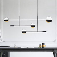 Lustre Zev : Élégance dorée en formes circulaires