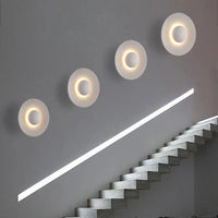Applique murale LED Design en forme de disque pour le secteur hôtelier et de la restauration.