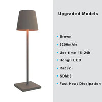 Lampe de table sans fil en métal noir, style varié.