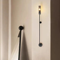 Applique murale design en cuivre noir et or