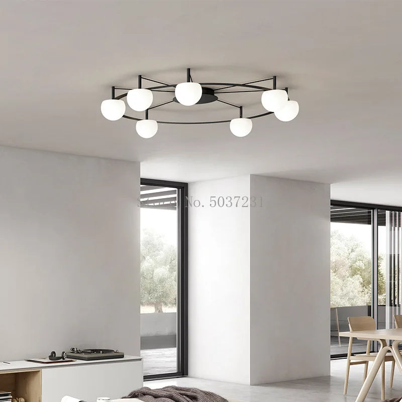 Plafonnier LED suspendu de style nordique moderne et minimaliste.
