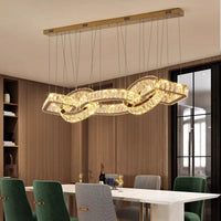 Lustre design en cristal doré pour une ambiance moderne dans votre salle à manger
