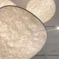 Suspension tendue Nordic LED en soie pour un éclairage minimaliste dans le salon ou la chambre à coucher.