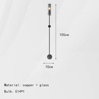 Applique murale design en cuivre noir et or