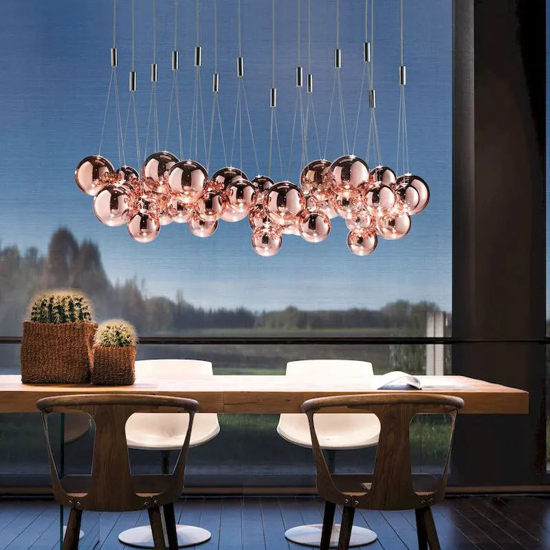 Suspension LED en boule de verre design chrome modern.