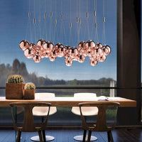 Suspension LED en boule de verre design chrome modern.