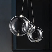 Suspension LED en boule de verre design chrome modern.