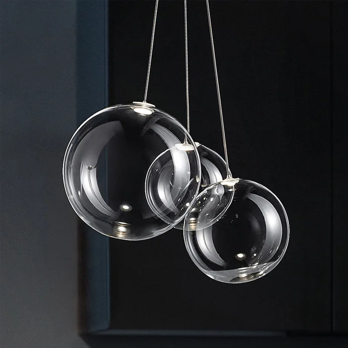Suspension LED en boule de verre design chrome modern.