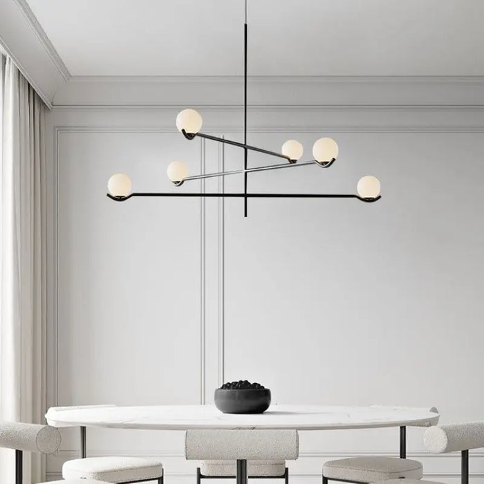Lustre minimaliste boule de verre Luces à LED pour un éclairage élégant et moderne dans votre intérieur