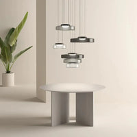 Suspension design danois bohème avec abat-jour en verre pour tables basses.
