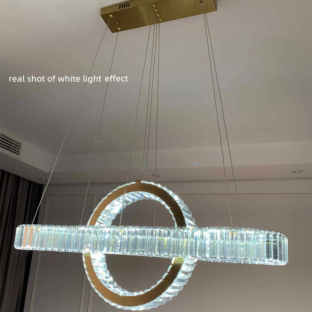 Lustre LED moderne en acier doré avec cristaux et câble ajustable