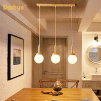 Suspension nordique en bois et verre