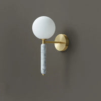Applique murale en marbre avec boule de verre pour une décoration lumineuse