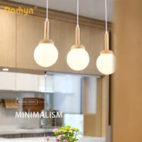 Suspension nordique en bois et verre