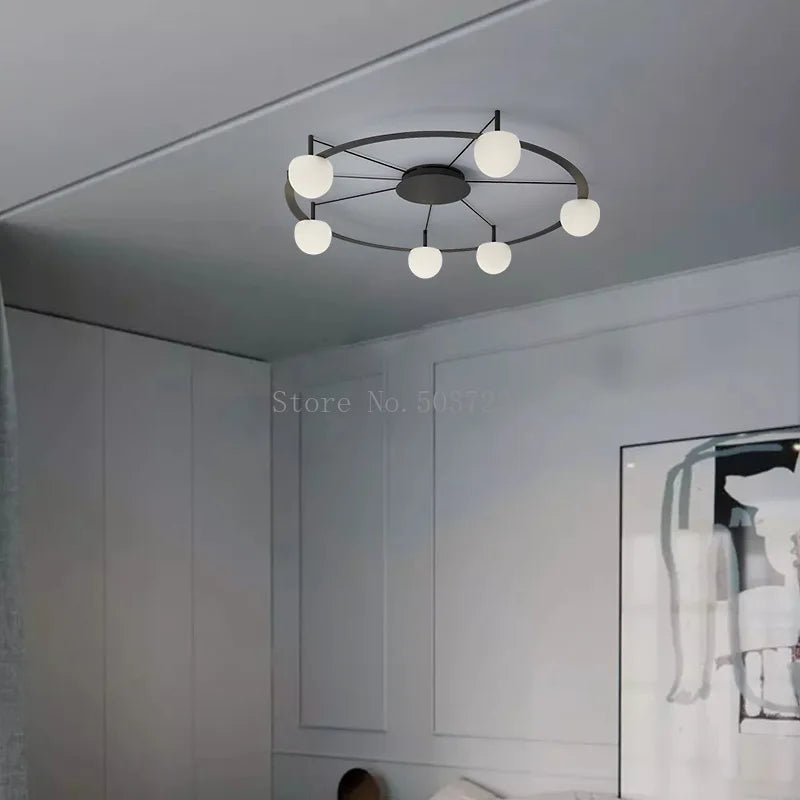 Plafonnier LED suspendu de style nordique moderne et minimaliste.