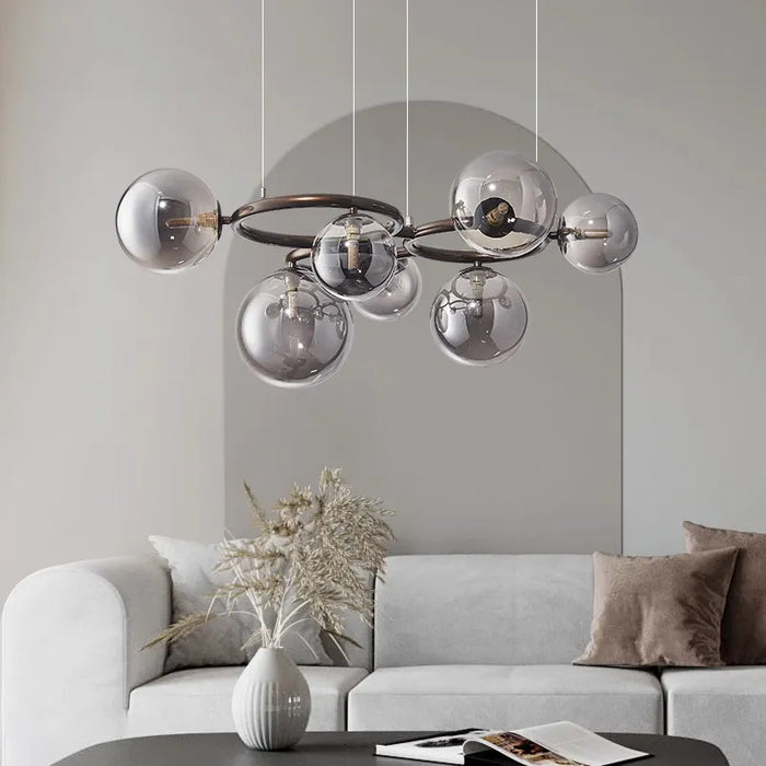 Lustre de verre et métal en boule et barre design