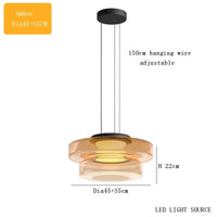 Suspension design danois bohème avec abat-jour en verre pour tables basses.