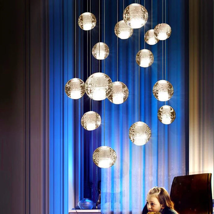 Lustre en cristal moderne avec boule tournante LED suspendue - LUXE LUMINEUX