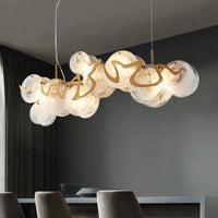 Suspension élégante en verre et métal doré E14