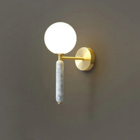Applique murale en marbre avec boule de verre pour une décoration lumineuse