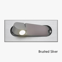 Applique murale de lecture avec spot intégré. | Marco Lucetti