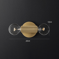 Applique murale design en métal double tête Deacon | Marco Lucetti