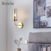 Applique murale design en verre et base dorée"Cylindre Chic" | Marco Lucetti