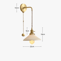 Applique murale dorée céramique moderne ajustable LED. | Marco Lucetti