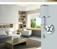 Applique murale en cristal moderne pour éclairer lit, allée et escalier. | Marco Lucetti