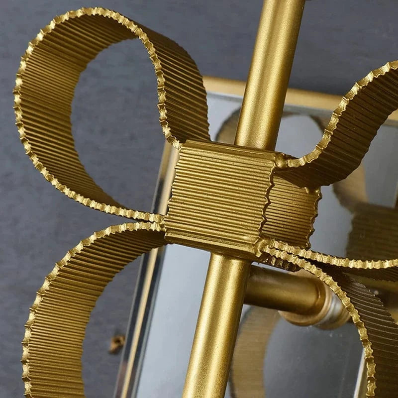 Applique murale en laiton en forme de nœud pour une touche de rêverie dans la chambre d'enfant | Marco Lucetti