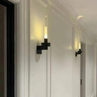 Applique murale en verre transparent et métal noir - Collection Élégance nocturne | Marco Lucetti