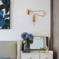 Applique murale industrielle noire et dorée à bras réglable. | Marco Lucetti