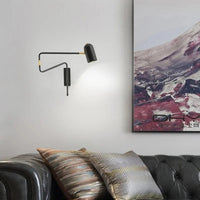 Applique murale industrielle noire et dorée à bras réglable. | Marco Lucetti