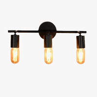 Applique murale industrielle rétro à plusieurs têtes minimalistes LED. | Marco Lucetti