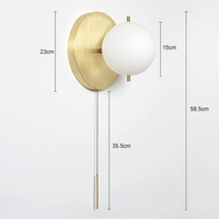 Applique murale Justyne avec globe en verre de luxe | Marco Lucetti