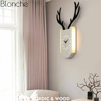 Applique murale LED avec horloge en forme de corne de cerf. | Marco Lucetti