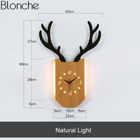 Applique murale LED avec horloge en forme de corne de cerf. | Marco Lucetti