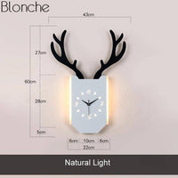 Applique murale LED avec horloge en forme de corne de cerf. | Marco Lucetti