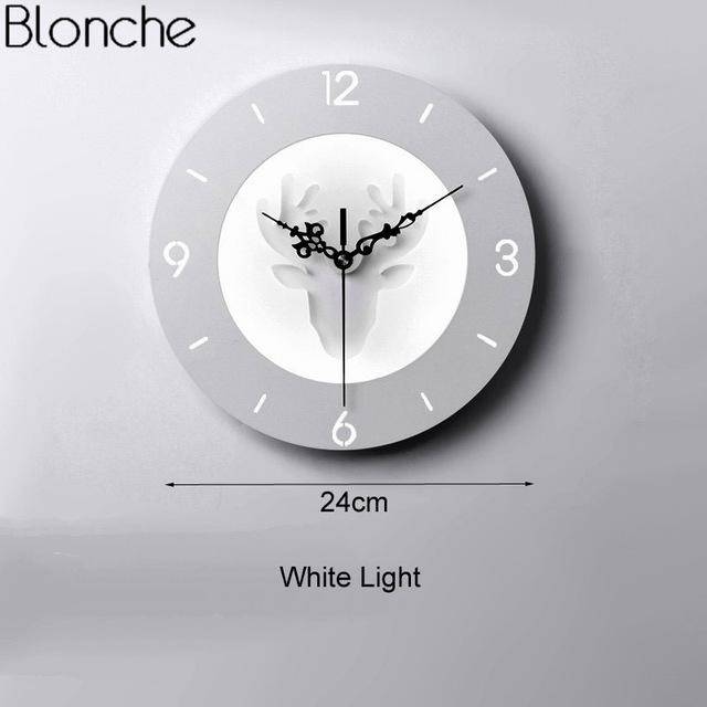Applique murale LED avec horloge en forme de corne de cerf. | Marco Lucetti Rond