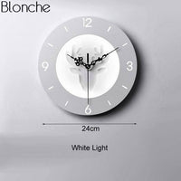 Applique murale LED avec horloge en forme de corne de cerf. | Marco Lucetti Rond