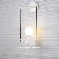 Applique murale LED Bonhomme Swinging | Marco Lucetti 1 lampe - Blanc / Chaude