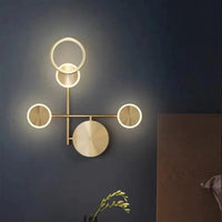 Applique murale LED dorée design | Marco Lucetti