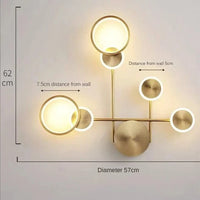 Applique murale LED dorée design | Marco Lucetti 4 têtes / 3 couleurs claires