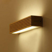 Applique murale LED en bois taillé Japan | Marco Lucetti