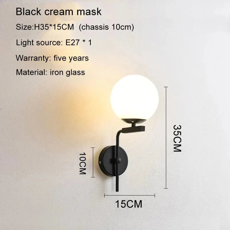 Applique murale LED moderne en boule de verre pour une décoration intérieure tendance | Marco Lucetti